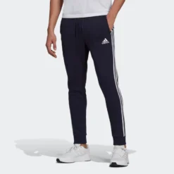 ADIDAS Pantalón Essentials Fleece Tapered Cuff 3 Bandas 8 ADIDAS Pantalón Essentials Fleece Tapered Cuff 3 Bandas -Equipo De Fitness pantalon essentials fleece tapered cuff 3 bandas 2