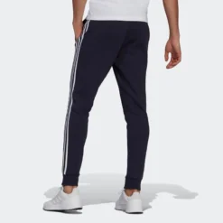 ADIDAS Pantalón Essentials Fleece Tapered Cuff 3 Bandas 9 ADIDAS Pantalón Essentials Fleece Tapered Cuff 3 Bandas -Equipo De Fitness pantalon essentials fleece tapered cuff 3 bandas 3