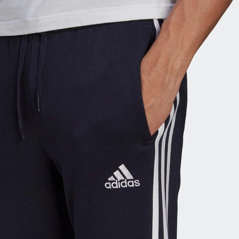 ADIDAS Pantalón Essentials Fleece Tapered Cuff 3 Bandas 5 ADIDAS Pantalón Essentials Fleece Tapered Cuff 3 Bandas - Imagen 5